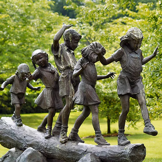 Kids Form The Letters Ymca Bronze Statue with Their Arms